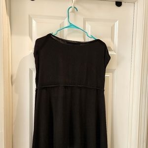 Studio M top size medium short sleeves color black flare waist asymmetri…